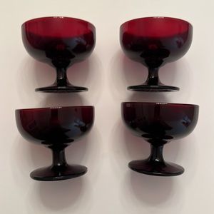 Set of 4 Ruby Red Glass Sherbet Dishes. Measures 3” Tall & Holds 3/4 Cup Liquid.